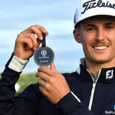 Scottish-born Australian Connor McKinney shows off his player tag at Dundonald Links after qualifying for the 151st Open. Picture: Mark Runnacles/R&A/R&A via Getty Images.