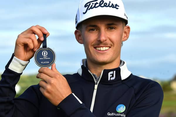 Scottish-born Australian Connor McKinney shows off his player tag at Dundonald Links after qualifying for the 151st Open. Picture: Mark Runnacles/R&A/R&A via Getty Images.