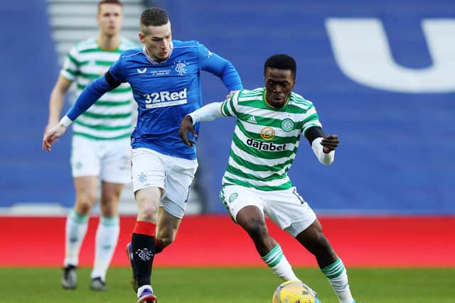 Celtic's Ismaila Soro (right) competes with Ryan Kent during the recent Scottish Premiership match between Rangers and Celtic at Ibrox