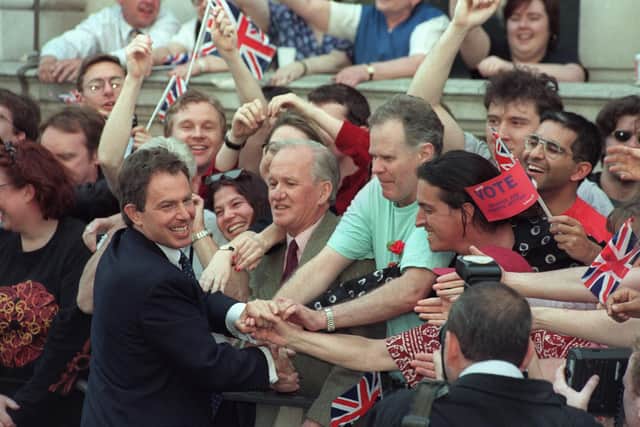 Tony Blair is greeted by supporters outside 10 Downing Street in May 1997. Picture: GERRY PENNY/AFP via Getty Images