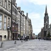 The High Street, which is normally thronged with visitors at this time of year, was virtually deserted on Friday lunchtime. Picture: Lisa Ferguson