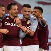 Ross Barkley, Jack Grealish and John McGinn celebrate during Aston Villa's remarkable 7-2 win over Liverpool.