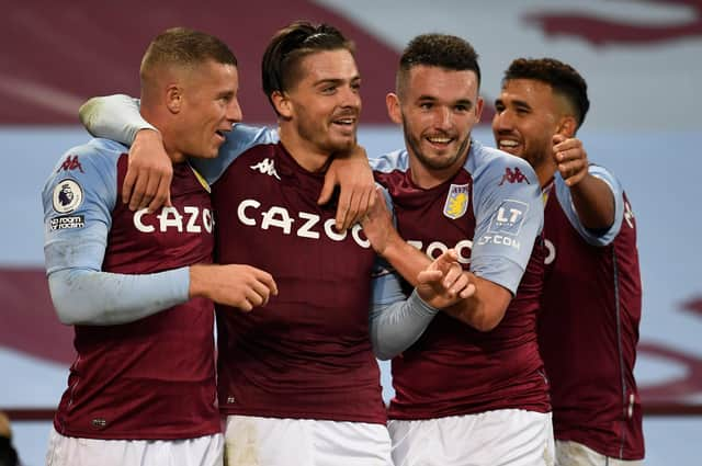 Ross Barkley, Jack Grealish and John McGinn celebrate during Aston Villa's remarkable 7-2 win over Liverpool.