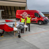 Royal Mail staff with the UAV which will be used for island deliveries