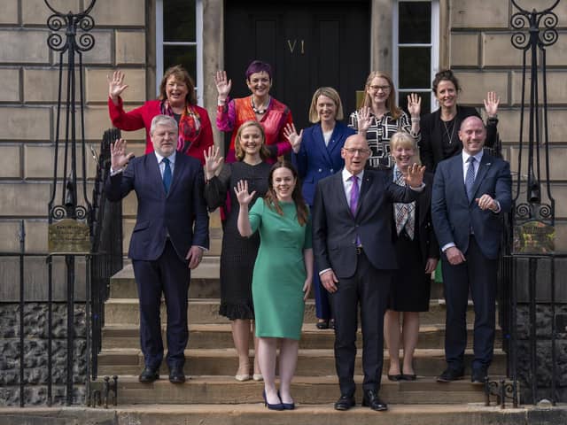 First Minister John Swinney and Deputy First Minister Kate Forbes outside Bute House with the Scottish cabinet.