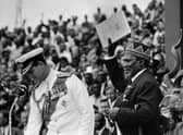 Nairobi, 13 December, 1963: Jomo Kenyatta, leader of the Kenya African National Union (KANU), holds the official document of Kenyan independence as he becomes President of Kenya. To his right is the Duke of Edinburgh, representing Queen Elisabeth for the ceremonies. PIC: AFP via Getty Images