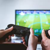 Research by Specsavers has revealed Scots gamers are wired to their headsets for 369 hours a year