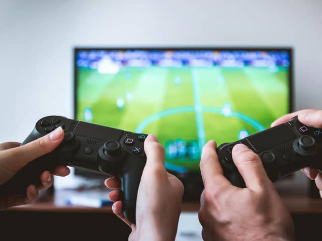 Research by Specsavers has revealed Scots gamers are wired to their headsets for 369 hours a year