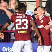 Kelty Hearts players run away in celebration as Ukranian Max Kucheriavyi scores to make it 1-0.