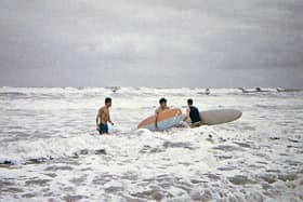 Stewart Crichton, Ian Wishart and George Law surfing in Aberdeen, 1968 PIC: Andy Bennetts