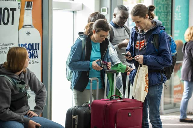 Travellers arrive in Edinburgh. A poll has found two in three tourist accommodation businesses in Scotland could close their doors for good due to the short-term lets scheme. Picture: Lisa Ferguson