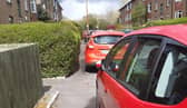 Pavement parking on a Glasgow street.