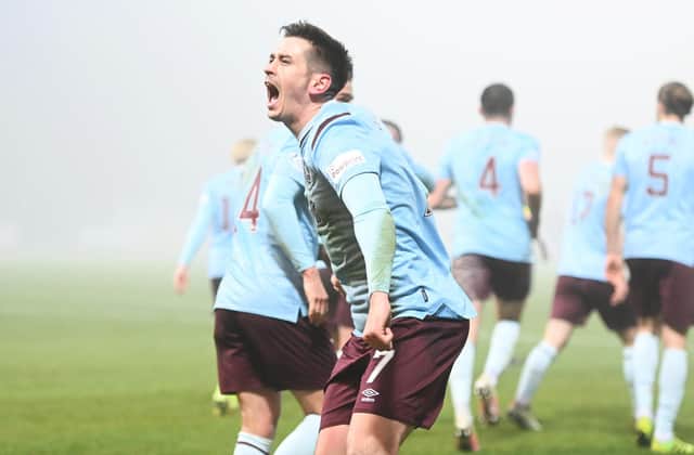 Jamie Walker celebrates his goal against Dundee at Dens Park.