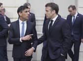 Prime Minister Rishi Sunak and President of France, Emmanuel Macron after a group picture during the first UK-France summit in five years at Elysee Palace in Paris.