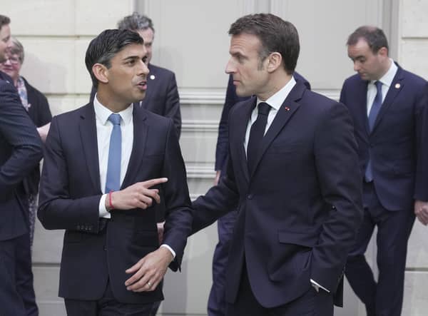 Prime Minister Rishi Sunak and President of France, Emmanuel Macron after a group picture during the first UK-France summit in five years at Elysee Palace in Paris.