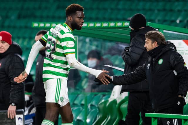 Odsonne Edouard shakes hands with Celtic coach Gavin Strachan after being substituted late in Wednesday's win. Picture: SNS