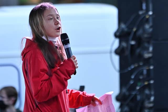 Teenage climate activist Greta Thunberg tells a mass rally in Glasgow that the COP26 climate summit was a "failure" -- the young Swede had earlier joined thousands of young people, including striking school pupils, for a march through the city. Picture: John Devlin