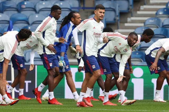 Lyon's players train on the Ibrox surface prior to tonight's match in the Europa League group stages. Picture: SNS