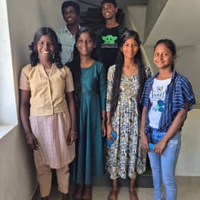The students benefitting from Pinnacle's school furniture