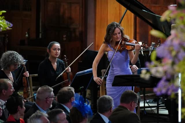 Violinist Nicola Benedetti performing during the National Service of Thanksgiving and Dedication for King Charles III and Queen Camilla, and the presentation of the Honours of Scotland, at St Giles' Cathedral, Edinburgh. Peter Byrne/PA Wire.