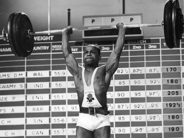 English weightlifter Precious McKenzie lifts 130 kilos to gain him a new Games record and gold medal at the 1970 Commonwealth Games in Edinburgh.