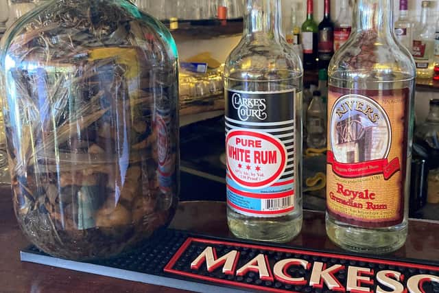 An 'under the counter' rum mix in Grenada. Pic: Hannah Stephenson/PA.