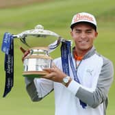 Rickie Fowler celebrates with the trophy after winning the 2015 Aberdeen Asset Management Scottish Open at Gullane. Picture: Andrew Redington/Getty Images.