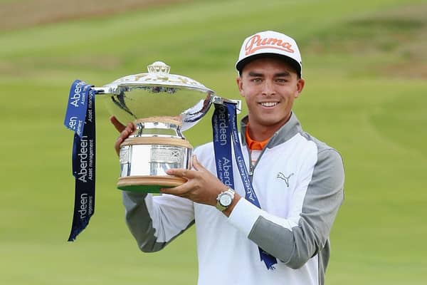 Rickie Fowler celebrates with the trophy after winning the 2015 Aberdeen Asset Management Scottish Open at Gullane. Picture: Andrew Redington/Getty Images.