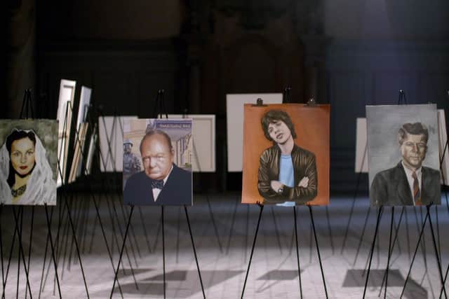 Portraits of celebrity guests including from Mick Jagger to Churchill and Billy Connolly, are displayed on a gallery wall over the staircase.