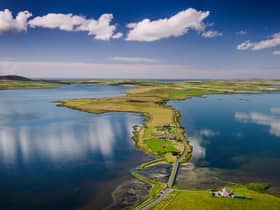 The Ness of Brodgar is a long, narrow isthmus of land between Loch Harray and Loch Stenness in Orkney, Scotland. The earliest buildings were constructed around 3,500 BC with ideas forged here going on to influence society across the rest of the country. PIC: Jim Richardson.
