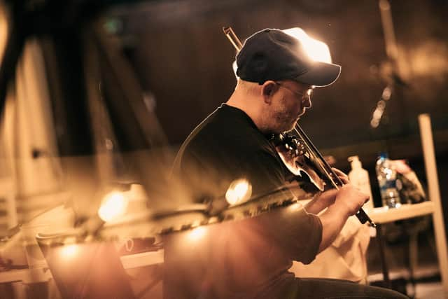 Folk musician Aidan O'Rourke on stage in Leith Theatre. Picture: Mihaela Bodlovic