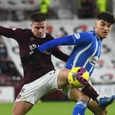 Hearts' Cammy Devlin challenges Kilmarnock's Benjamin Chrisene during the victory over the Ayrshire men at Tynecastle.