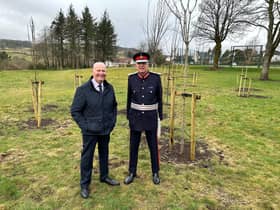 Trees planted in a Kilmacolm beauty spot have been dedicated to the late Queen Elizabeth II as part of a major environmental project.  Inverclyde. Environment and regeneration convener, Councillor Michael McCormick, left, and Lord-Lieutenant Colonel Peter McCarthy.