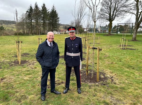Trees planted in a Kilmacolm beauty spot have been dedicated to the late Queen Elizabeth II as part of a major environmental project.  Inverclyde. Environment and regeneration convener, Councillor Michael McCormick, left, and Lord-Lieutenant Colonel Peter McCarthy.