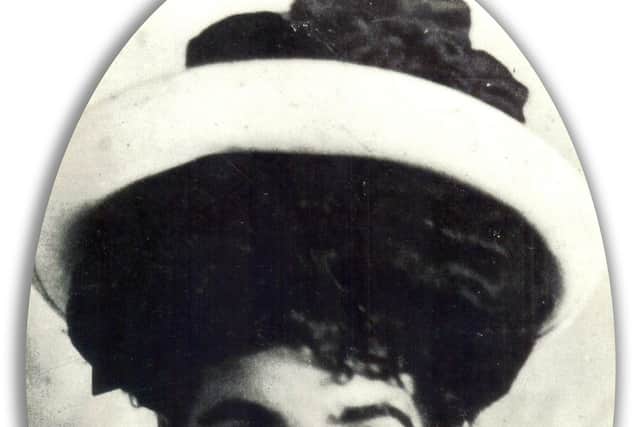 Mary Petrie Smith pictured in her 1911 passport photo before her one-way voyage to Canada. PIC: Contributed.
