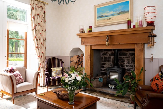A log-burning stove ensures the room is cosy in colder months.