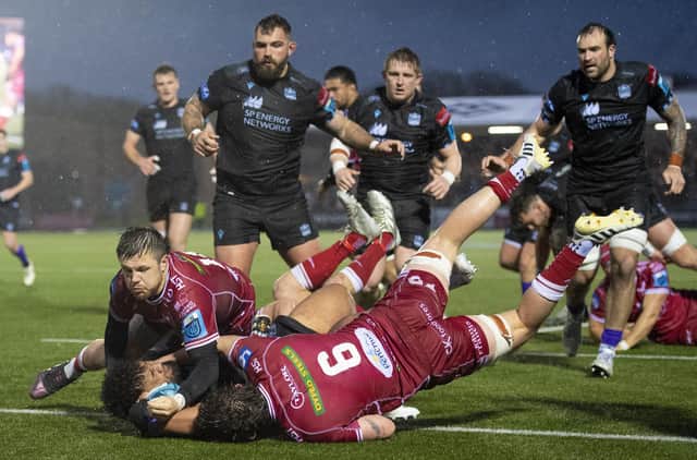 Warriors’ Sione Vailanu scores a try against Scarlets when the sides met at Scotstoun in the URC on April 14.  (Photo by Ross MacDonald / SNS Group)