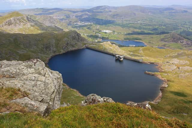 Energy can be stored in several forms, including pumped hydro schemes - where excess renewable power is used to pipe water uphill to be held in a reservoir during times of low demand and then released to generate electricity when needed