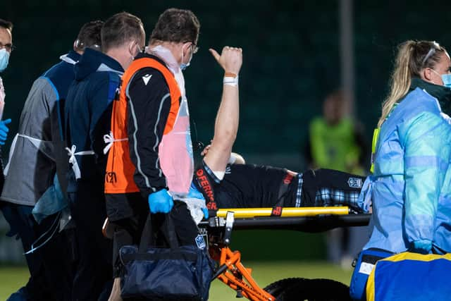 Scott Cummings gives a thumbs up after suffering a head injury in Glasgow Warriors' win over Edinburgh at Scotstoun. Picture: Ross MacDonald/SNS