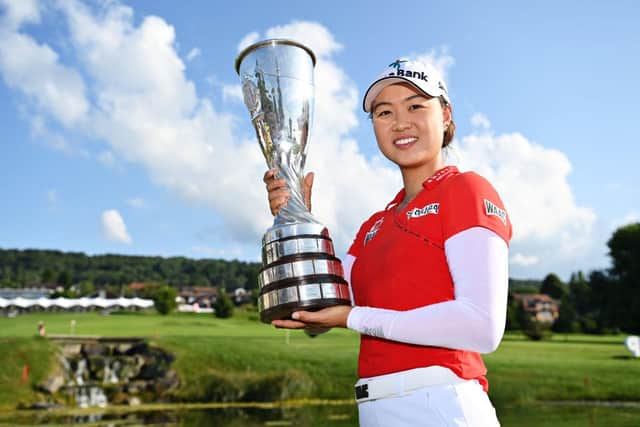 Minjee Lee poses the trophy after winning the Amundi Evian Championship at Evian Resort Golf Club in France last month. Picture: Stuart Franklin/Getty Images.