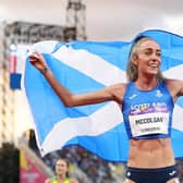 Eilish McColgan of Team Scotland celebrates with their teams flag after winning the gold medal in the Women's 10,000m Final on day six of the Birmingham 2022