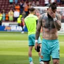 Dundee Utd's Steven Fletcher is dejected after relegation was confirmed with defeat at Motherwell.  (Photo by Alan Harvey / SNS Group)
