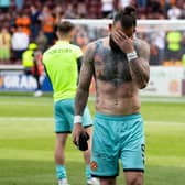 Dundee Utd's Steven Fletcher is dejected after relegation was confirmed with defeat at Motherwell.  (Photo by Alan Harvey / SNS Group)