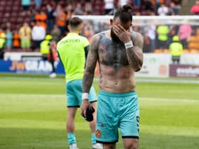 Dundee Utd's Steven Fletcher is dejected after relegation was confirmed with defeat at Motherwell.  (Photo by Alan Harvey / SNS Group)