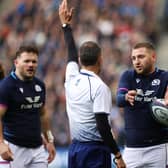 Finn Russell chats to referee Roman Poite during a Scotland-Australia match at Murrayfield. (Photo by Craig Williamson / SNS Group)