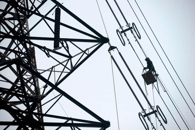 Scottish renewable generators are paying significantly more under the system that allocates charges for using the transmission network. Picture: AFP/Getty Images.