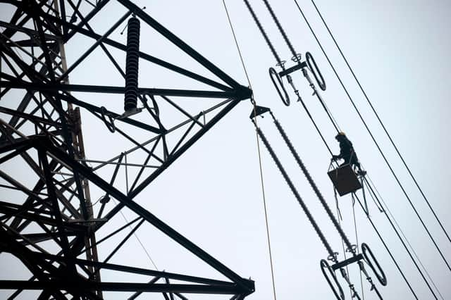 Scottish renewable generators are paying significantly more under the system that allocates charges for using the transmission network. Picture: AFP/Getty Images.