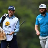 Liam Johnston walks with his caddie on the 15th hole during the opening round of the Kenya Savannah Classic at Karen Country Club in Nairobi. Picture: Stuart Franklin/Getty Images.