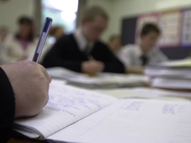 The OECD report has said Scottish teachers are spending too much time in classrooms