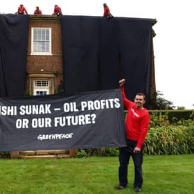 Greenpeace activists on the roof of Britain's Prime Minister Rishi Sunak's manor house in Kirby Sigston